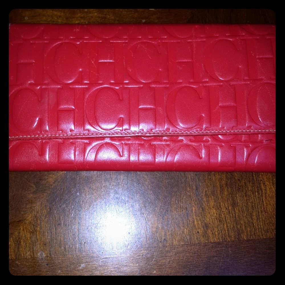 Red Carolina Herrera leather wallet, CH monogram.